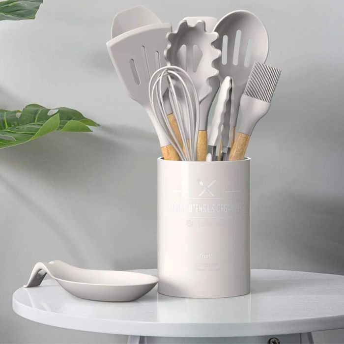 The set of utensils placed neatly in a matching canister