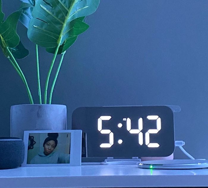 A reviewer's bright, mirrored clock.