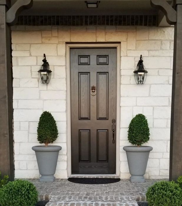 Another reviewer presents their front door, now refreshed with a sleek black coat of paint.
