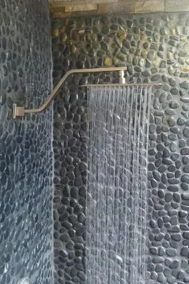 A slim spout with a flat, wide water head, creating a graceful cascade of water.
