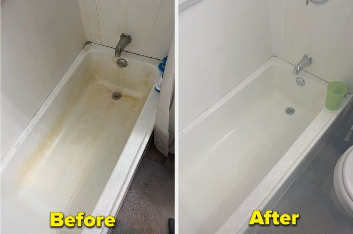 A reviewer posts before-and-after images of their bathtub. Before, it's covered in rust and grime, and after using The Pink Stuff, it looks sparkling white and spotless.