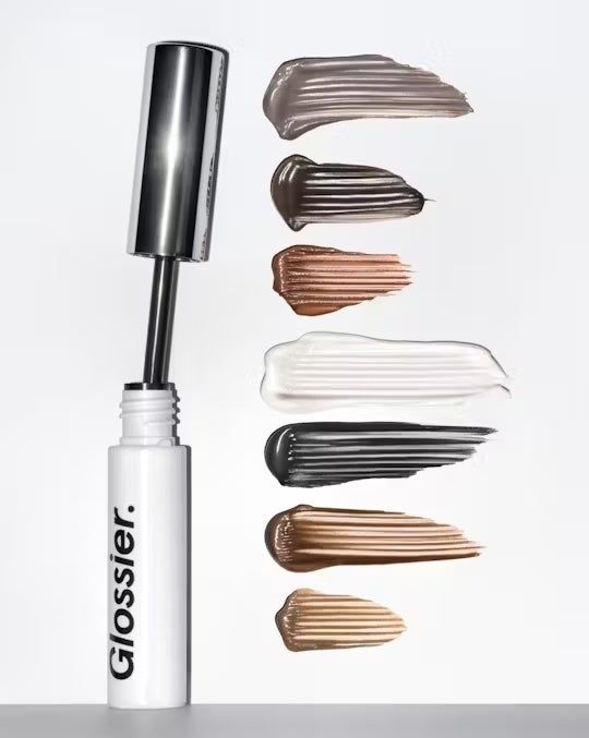 Various shades of Glossier mascara on display