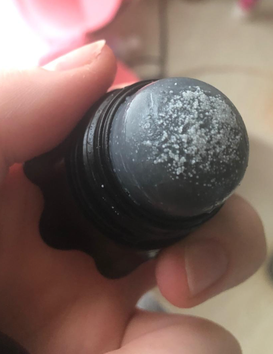The cap removed to reveal the salt on top of the remover