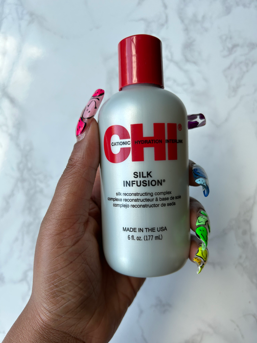 Me, holding the Chi silk infusion bottle