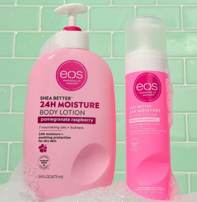 EOS Shea Better 24H Moisture Pomegranate Raspberry Body Lotion and Shave Cream, enriched with 7 nourishing oils and butters, presented alongside bubbly soap for an indulgent experience.