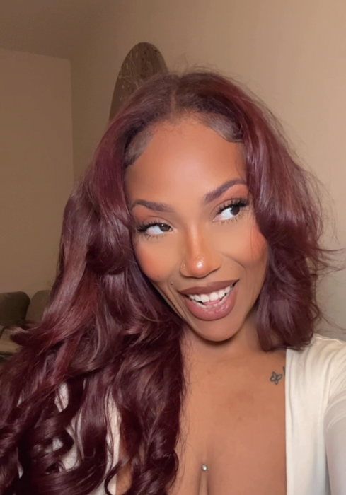 Jordan Grigsby selfie showing off her vibrant red hair