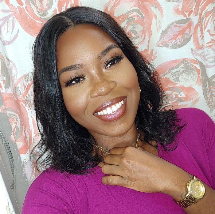 A reviewer shows off their super-smooth foundation look after applying the primer.