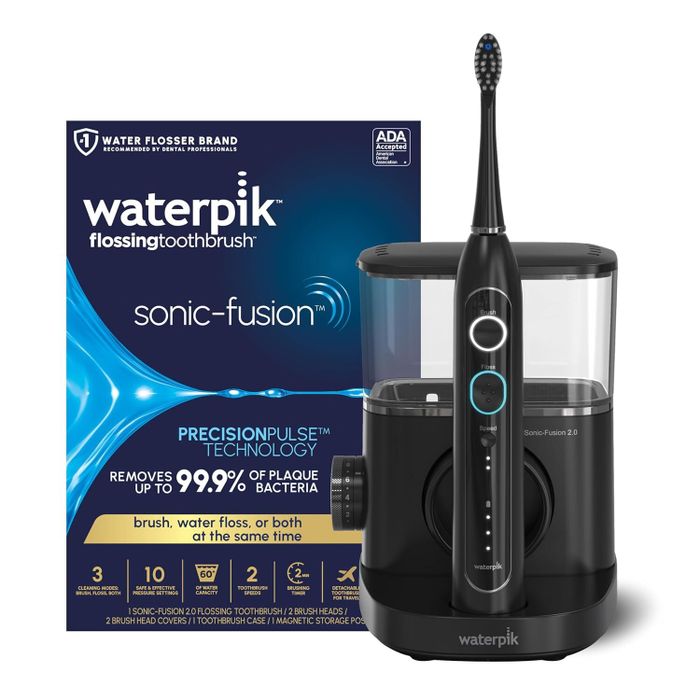 A black flosser and toothbrush set