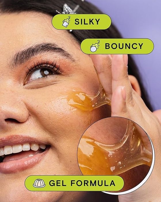 A woman massages a golden gel onto her face. The image displays text highlighting the product's key features as