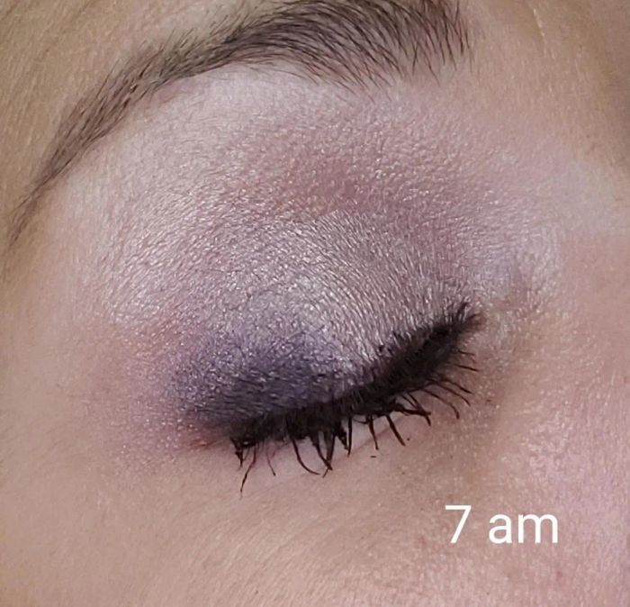 reviewer rocking purple eyeshadow, labeled