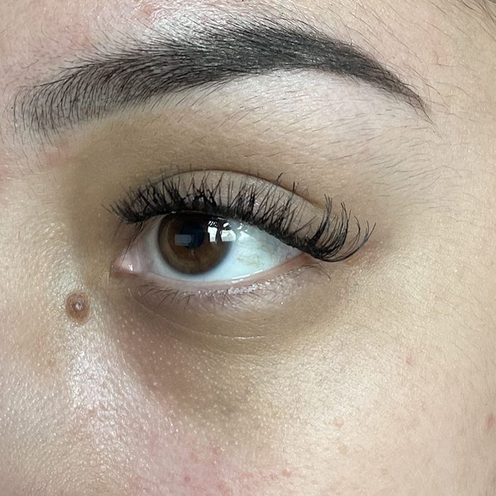 Close-up of a reviewer's fake lashes