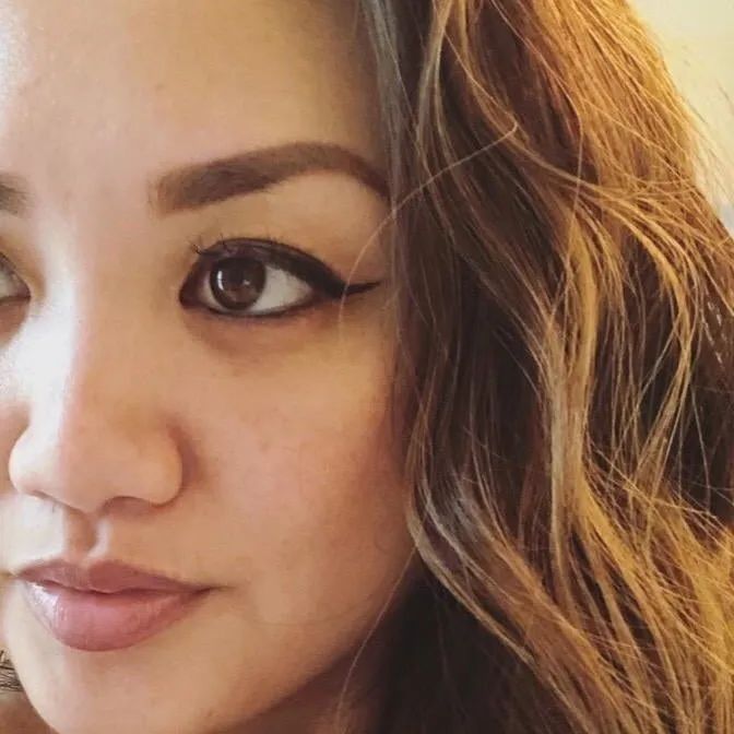 Close-up of a reviewer showcasing winged eyeliner on their eye