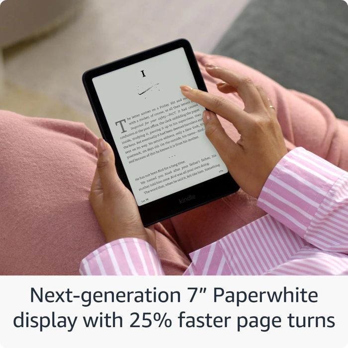 A person reading on a Kindle, featuring the new 7-inch Paperwhite display and 25% faster page turns for a smoother reading experience.