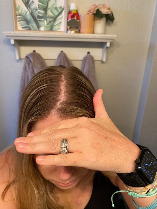 A reviewer’s hair shown before using the dry shampoo
