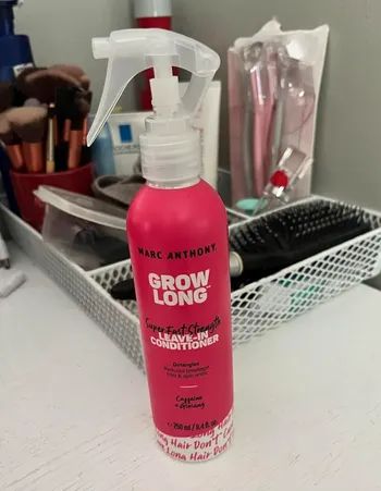 Marc Anthony Grow Long conditioner bottle.