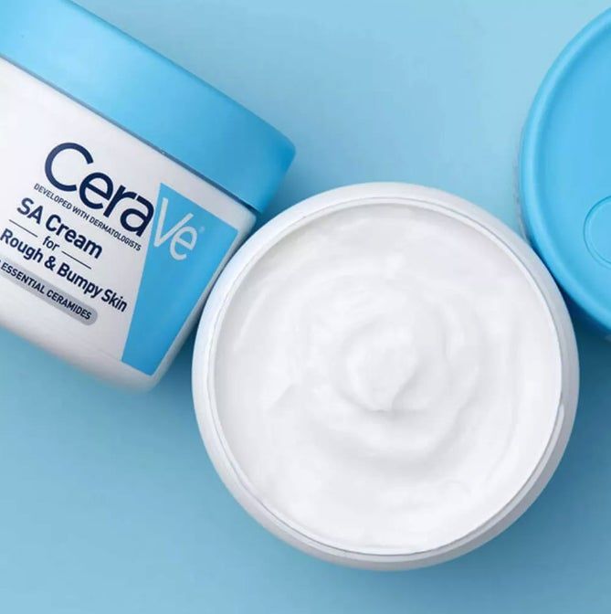 CeraVe SA Cream for Rough & Bumpy Skin in an open jar, revealing a smooth, white cream inside