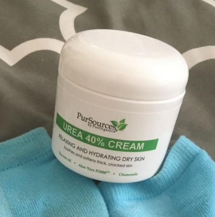 A reviewer’s photo of the tub of foot cream