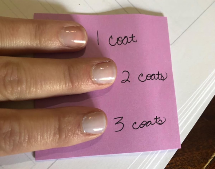 A photo from a reviewer showcasing their nails with 1, 2, and 3 coats of polish