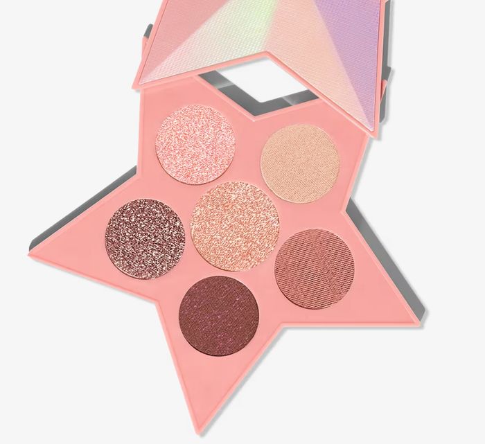 The star-shaped palette with six mesmerizing shadows, now open and ready for use.