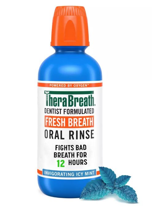 TheraBreath Fresh Breath Oral Rinse bottle featuring the text 