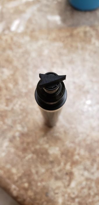 reviewer demonstrating the winged tip of the eyeliner