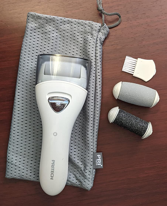 A photo from a reviewer showing the electric callus remover with replacement cartridges