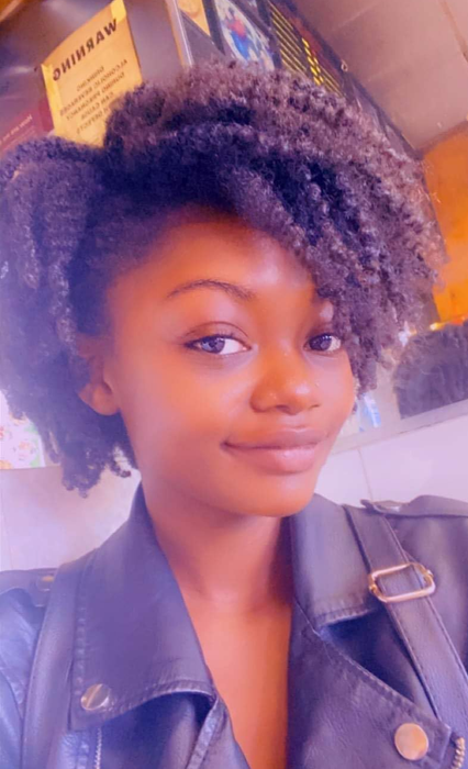 A reviewer with 4c hair after using the oil