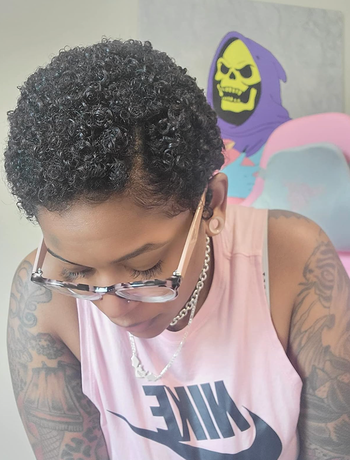 Reviewer's curly hair styled with mousse