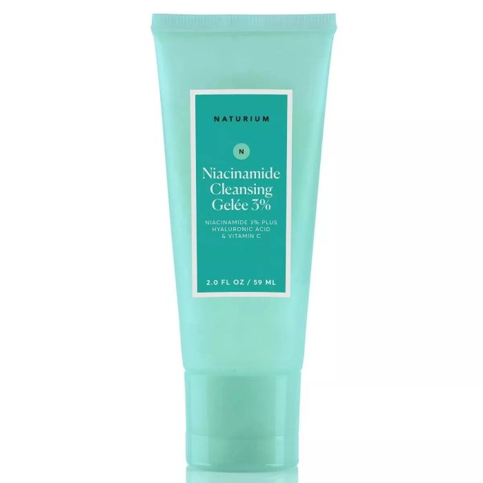 Front view of a 2.0 FL OZ (59 ML) tube of Naturium Niacinamide Cleansing Gelée 3%, with modern packaging that highlights its skincare benefits, including niacinamide and Vitamin C.