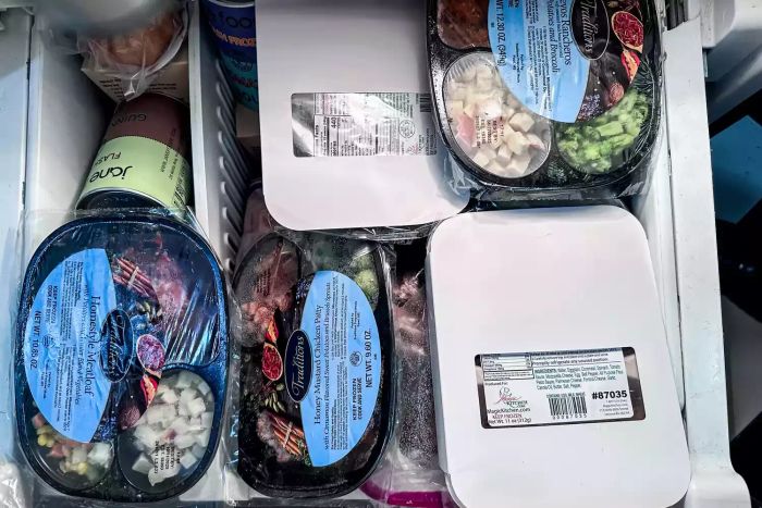 Multiple Magic Kitchen meals packed together in a shipping box.