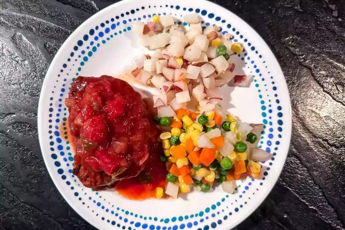 A Magic Kitchen meal served on a plate, ready to enjoy.