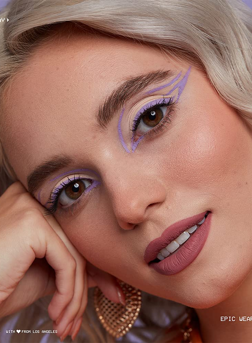 A model wearing soft lavender eyeliner