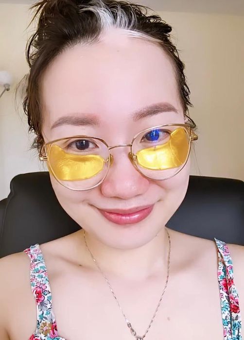 Reviewer wearing the glamorous gold eye gels.
