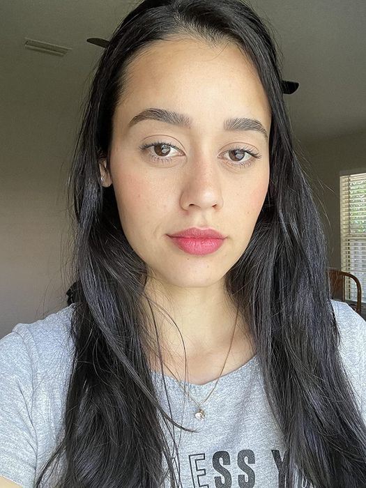 After photo of a reviewer wearing a pink-red lip stain.