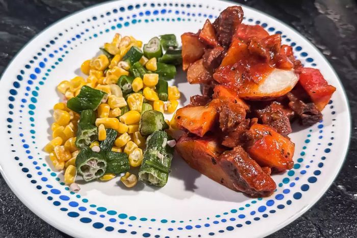 A serving of Magic Kitchen meal arranged neatly on a plate.