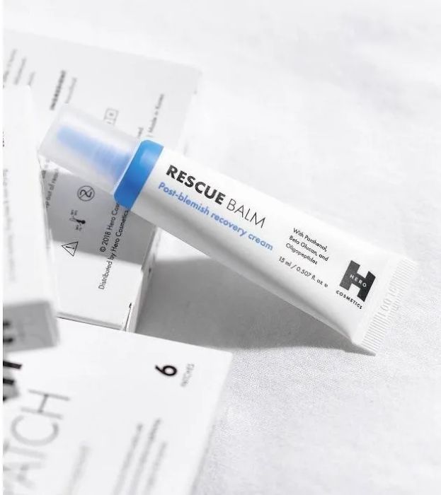 A blue and white skincare product package designed to aid in post-blemish recovery.
