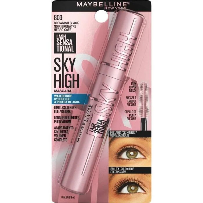 A pink mascara tube in its packaging, with a before and after photo