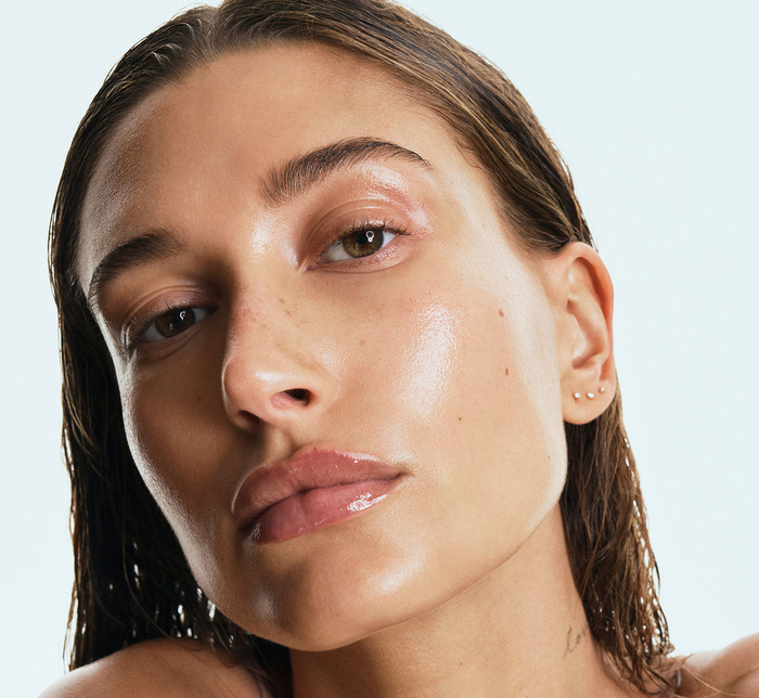 Hailey Bieber is seen sporting a lip treatment for a perfect pout.