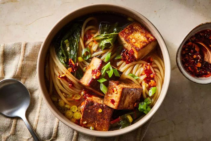 Crispy tofu noodle soup served in a bowl