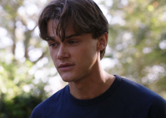 Conrad deep in thought, outdoors