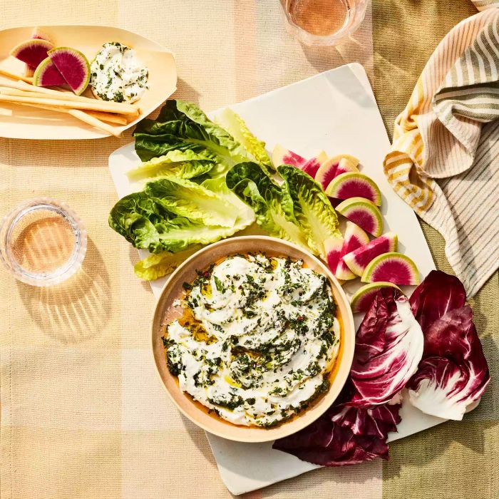 Chimichurri Yogurt Dip in a Bowl Served Alongside Lettuce and Red Cabbage Leaves