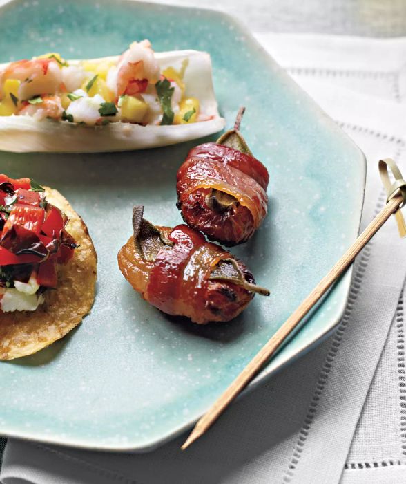 Bacon-Wrapped Apricots With Sage Served on a Blue Plate