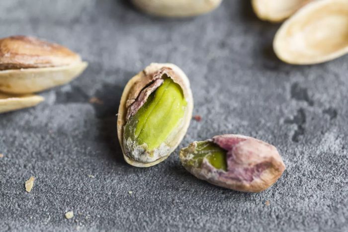 A pistachio inside its shell