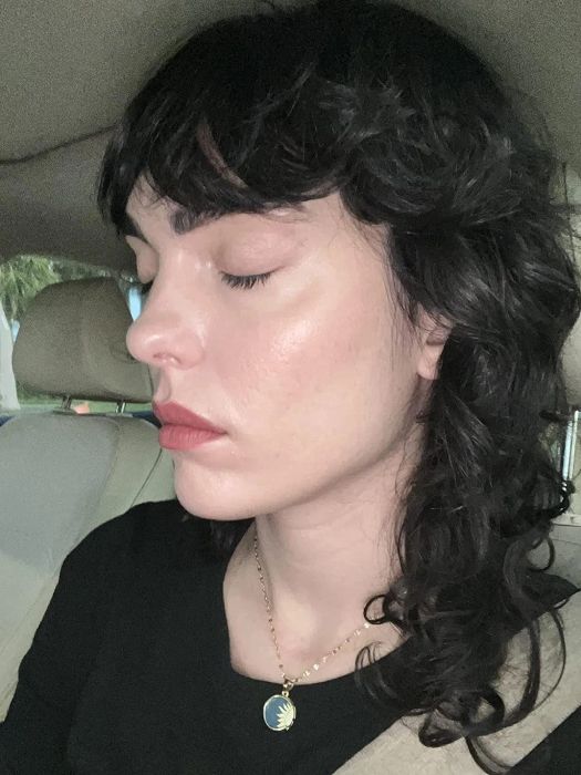 A reviewer glowing after applying the BB cream, with a luminous finish.