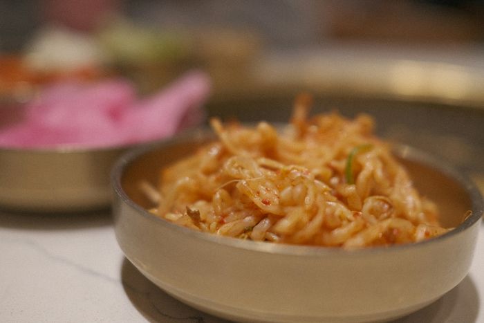 A close-up of a food bowl resting on a table