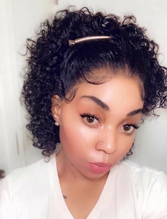 Reviewer’s hair after applying Wrap Me Lotta Body mousse, showing smooth, voluminous curls