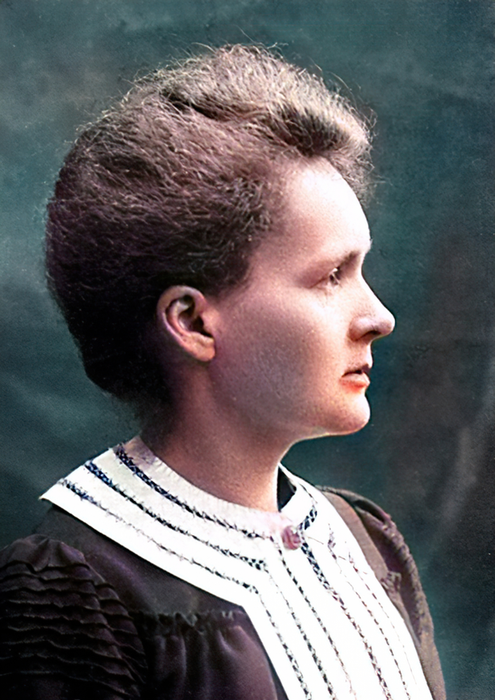 A profile of a woman with a sophisticated updo and formal attire, evoking the image of a historical or scientific figure