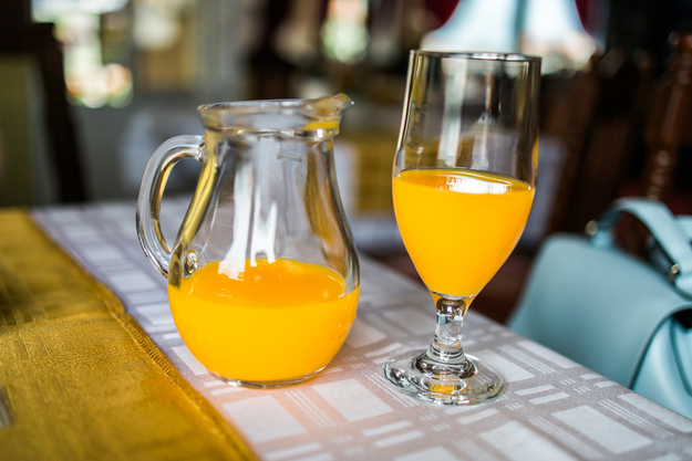 A jug of fresh orange or tangerine juice, served for breakfast at the hotel