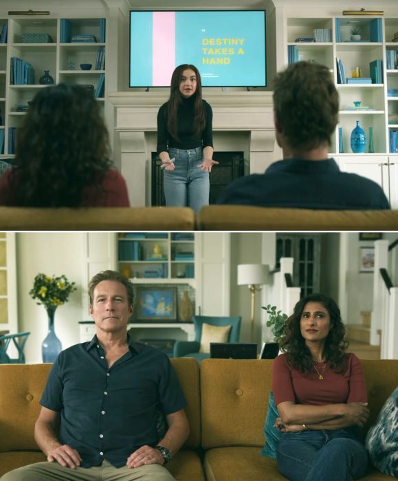 Kitty passionately addressing Dan and Trina while presenting in a cozy living room.