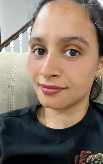A reviewer wearing the lip gloss